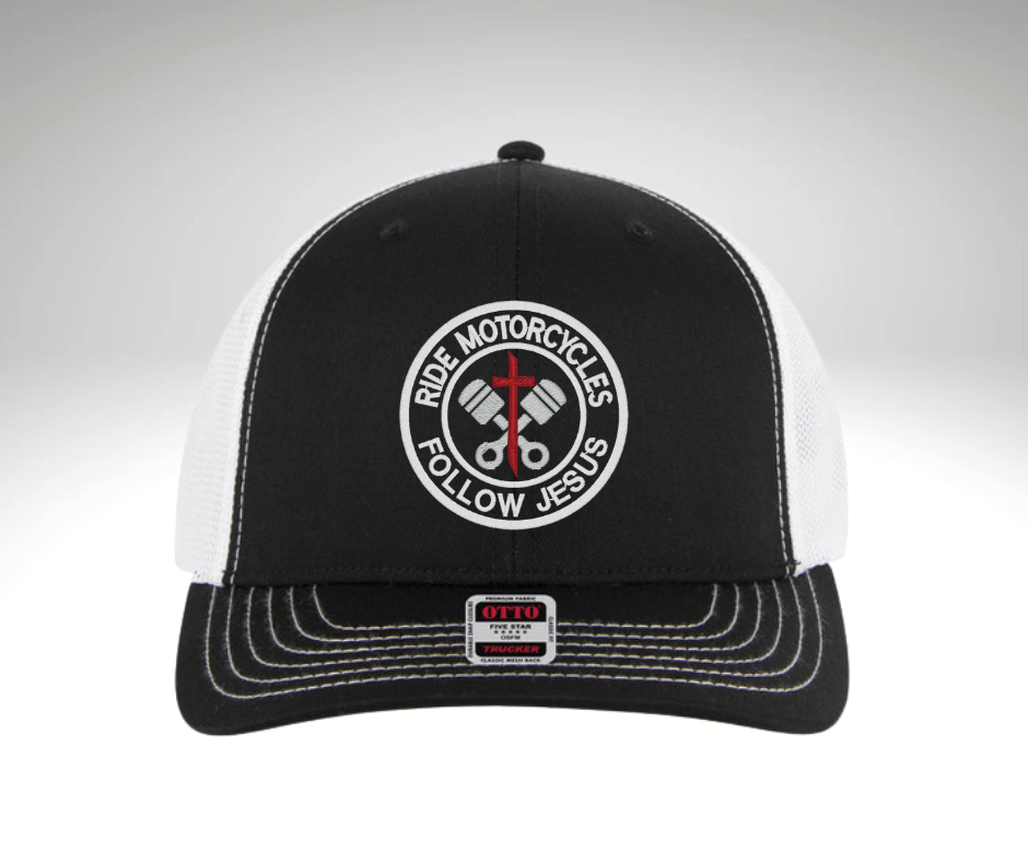 "Black and white trucker hat with embroidered RIDE MOTORCYCLES FOLLOW JESUS design, mesh back, and adjustable snapback – Christian biker apparel"